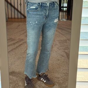 Distressed Blue Jeans with Frayed Hem